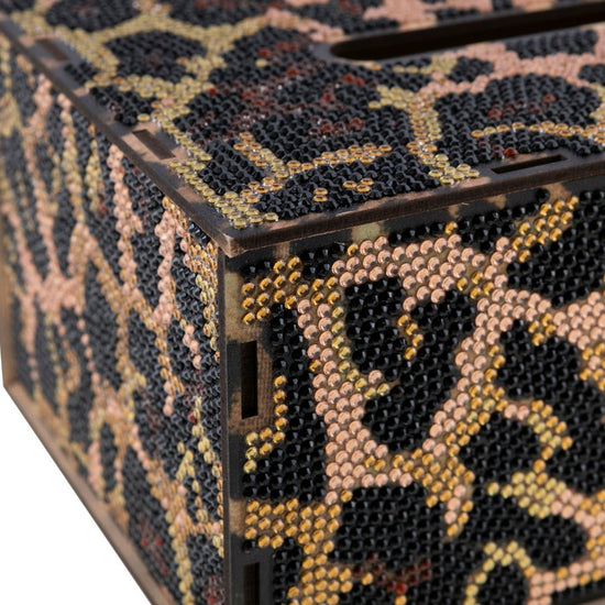 leopard crystal art tissue box close up 